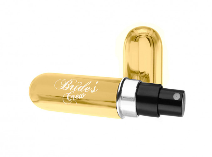 Gouden parfumverstuiver met daarop bride's crew gegraveerd