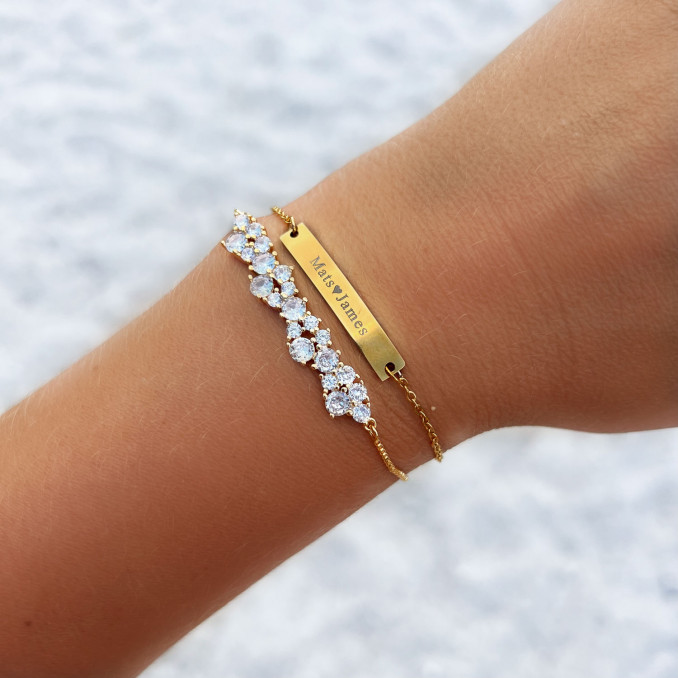 Gouden bar armband in armparty