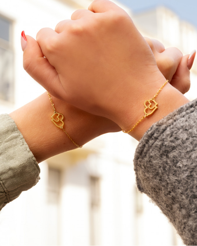 Gouden armbanden voor moeder en dochter met hartjes