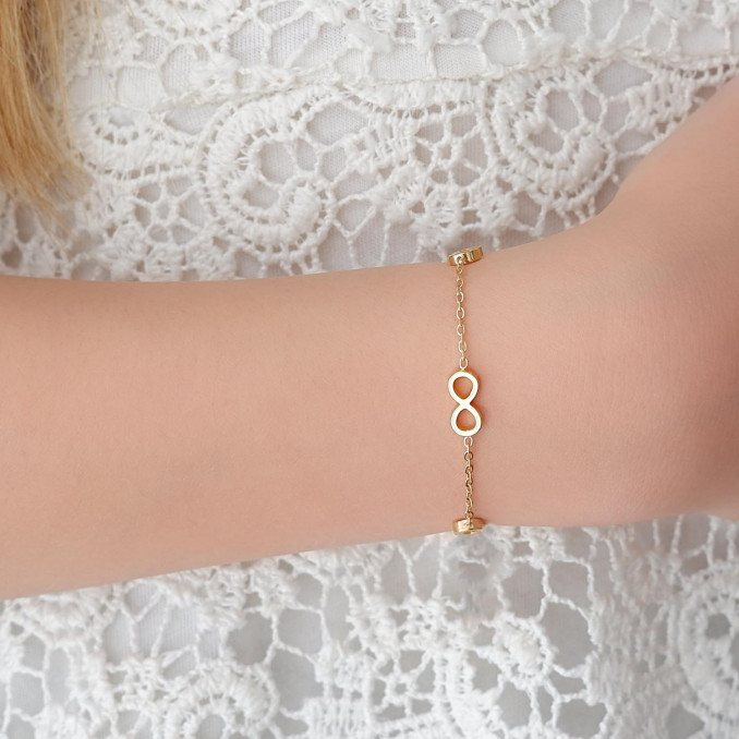 Gouden armbandje met infinity tekens voor een complete set