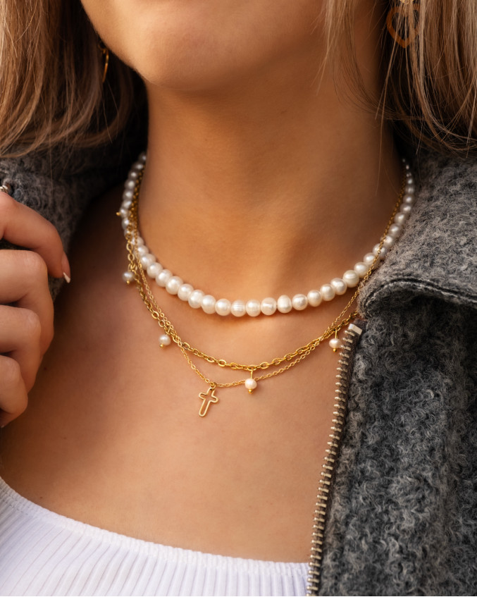 Gouden necklaceparty met parels