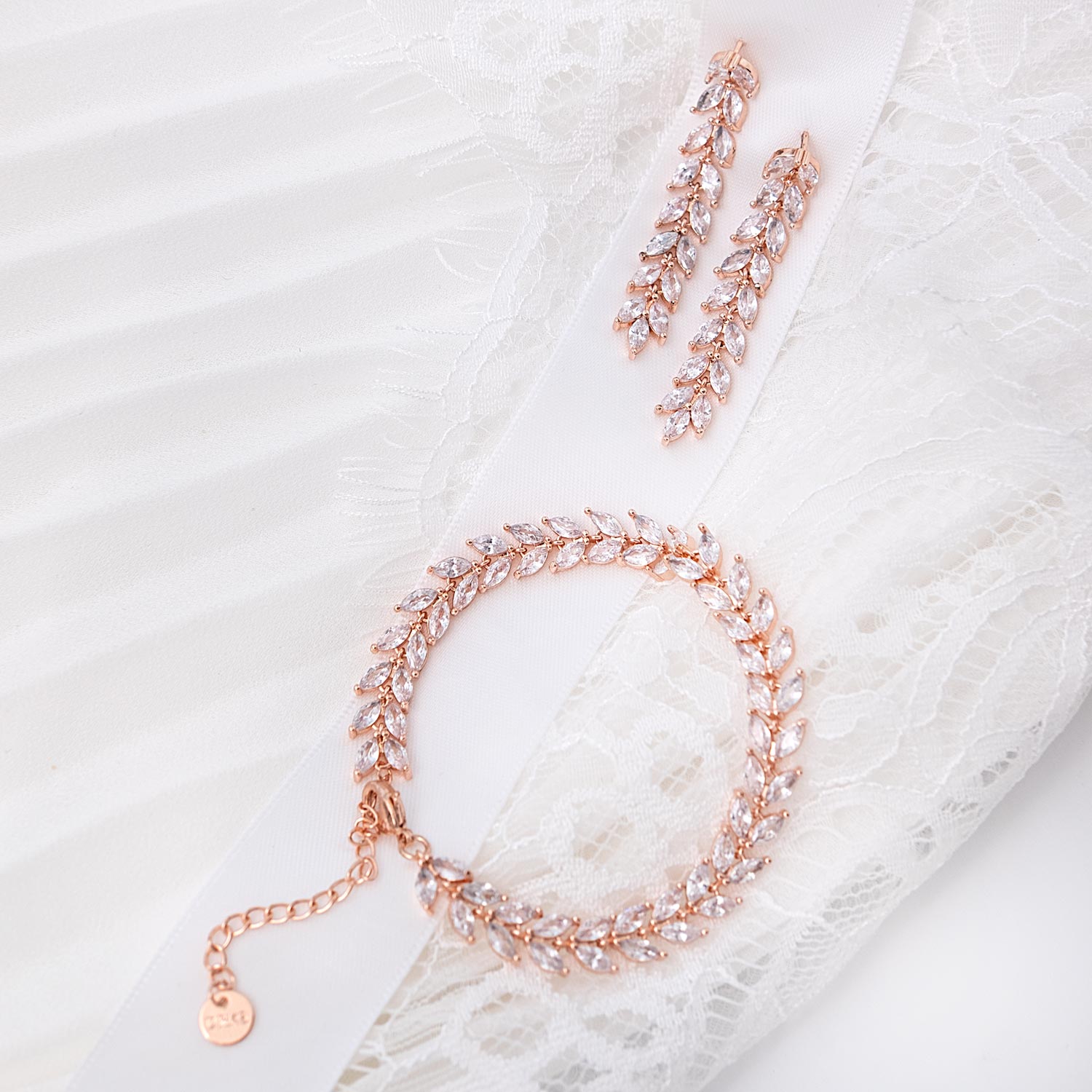 Armband & oorbellen set voor de bruid rose goud kleurig