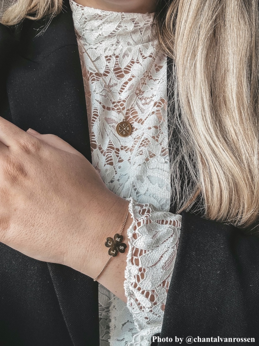 influencer met DRKS initial clover armband.