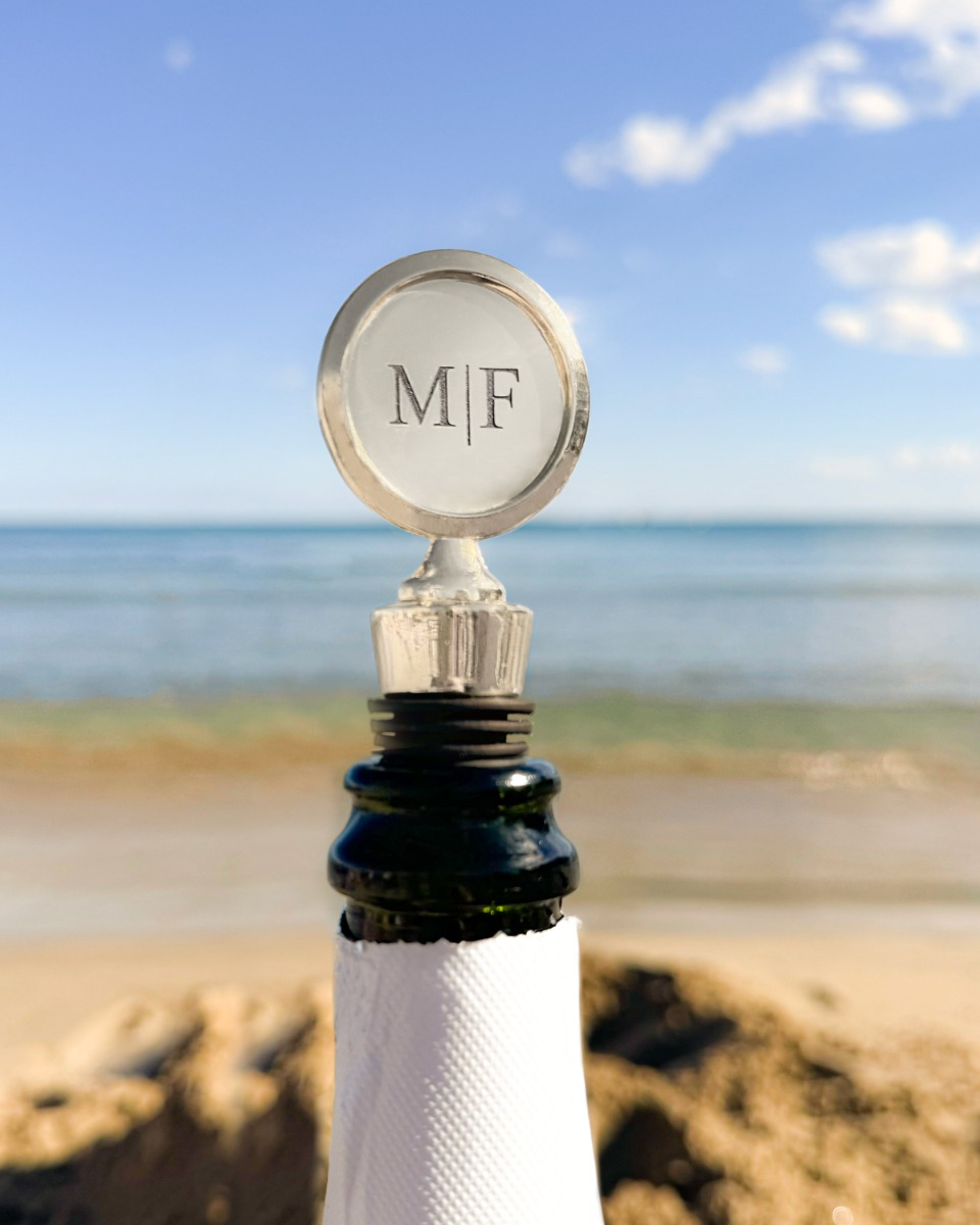 Wijnopener zilver op het strand