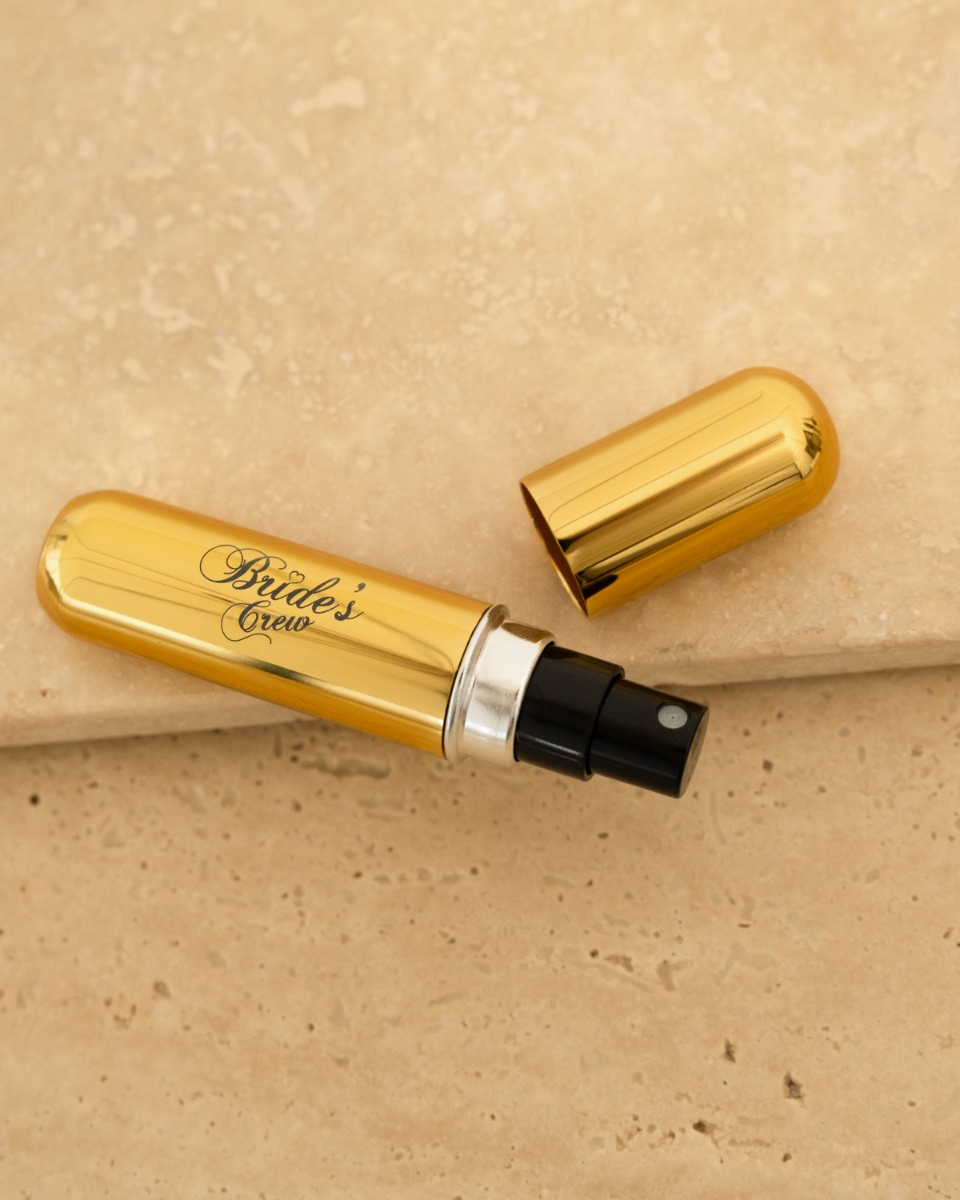 Gouden parfumverstuiver voor de bride's crew