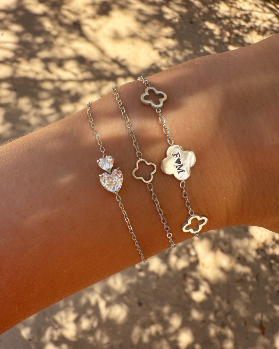 Zilveren armparty hartjes en klavers