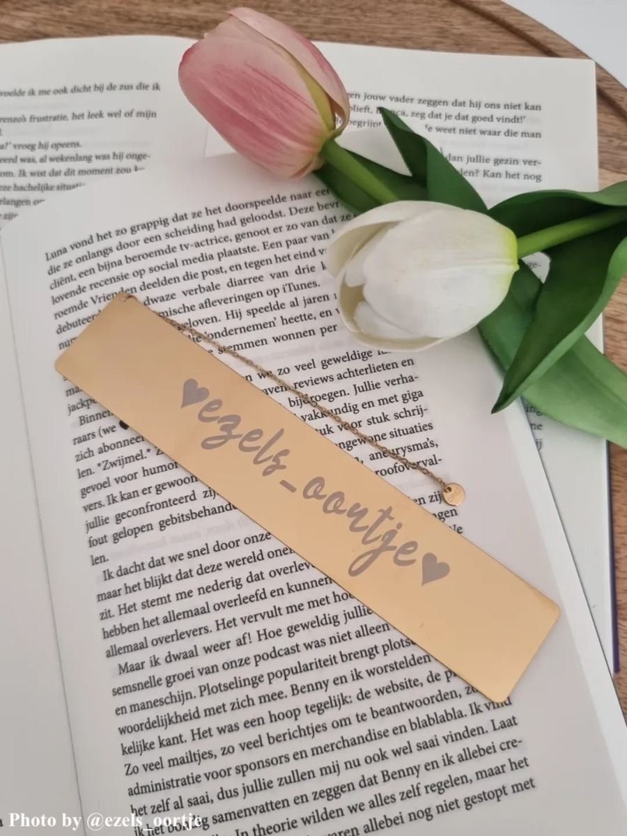 Gouden boekenlegger met gravering
