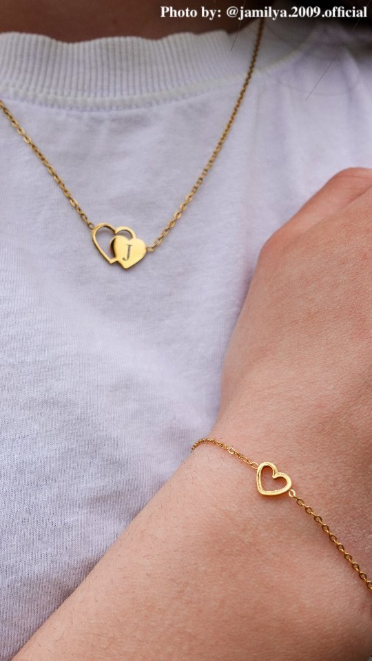 Gouden armband met hartje.