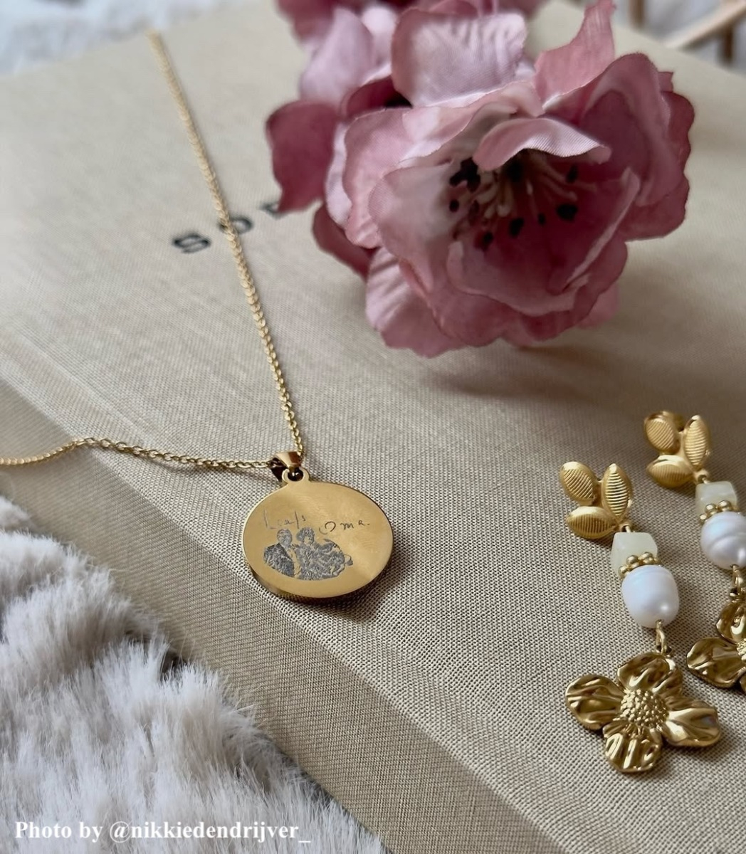 Gouden foto ketting.