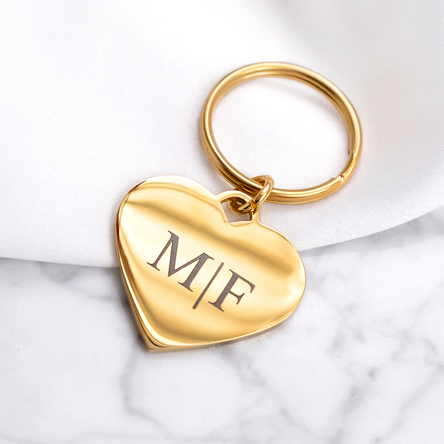 Gouden hartjes sleutelhanger met initialen