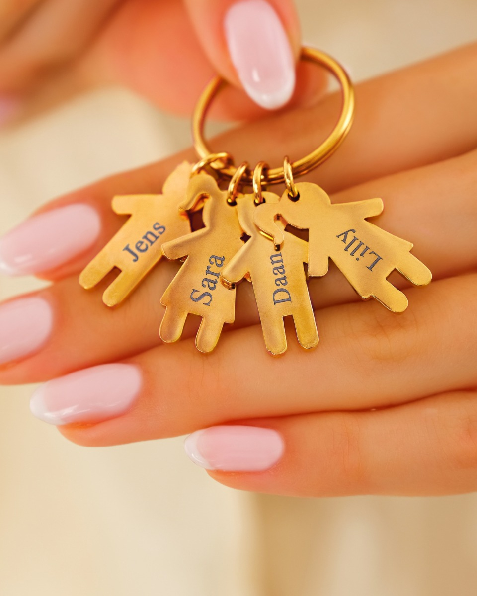 Sleutelhanger met kindjes goud