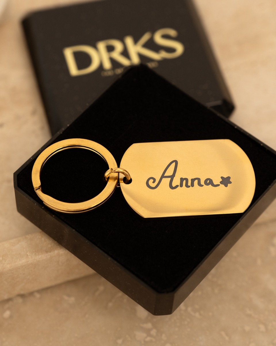 Tekening sleutelhanger goud met naam