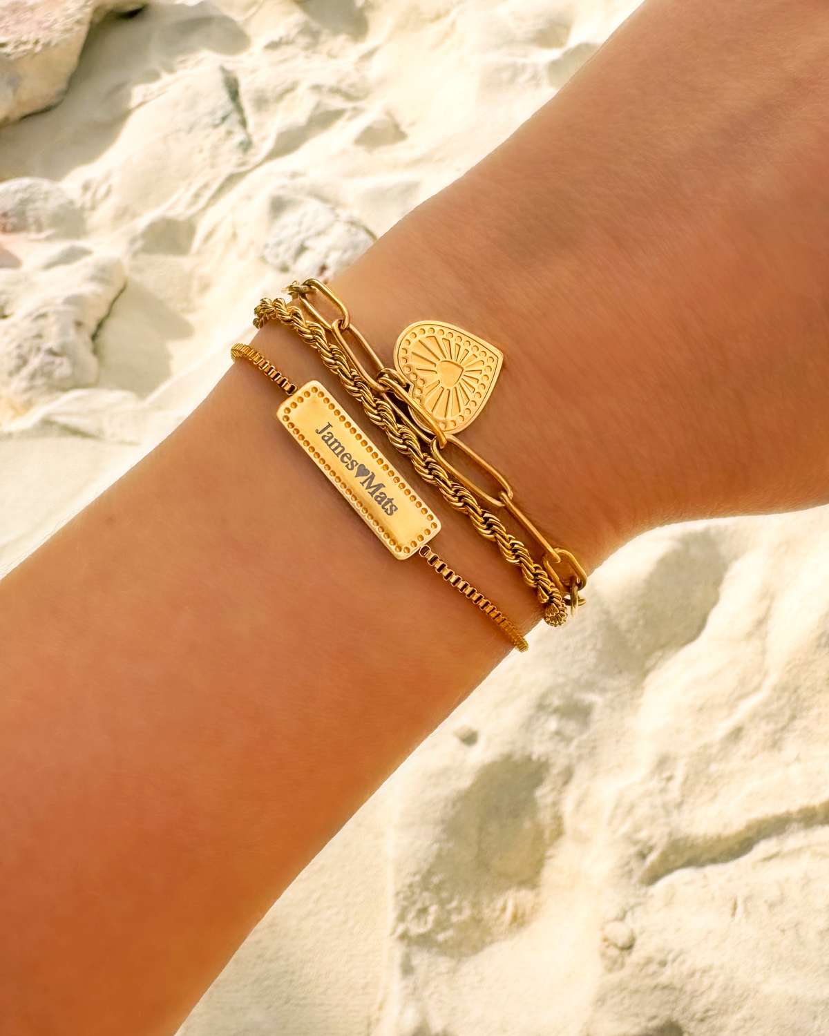 Gouden armparty met hartjes armband