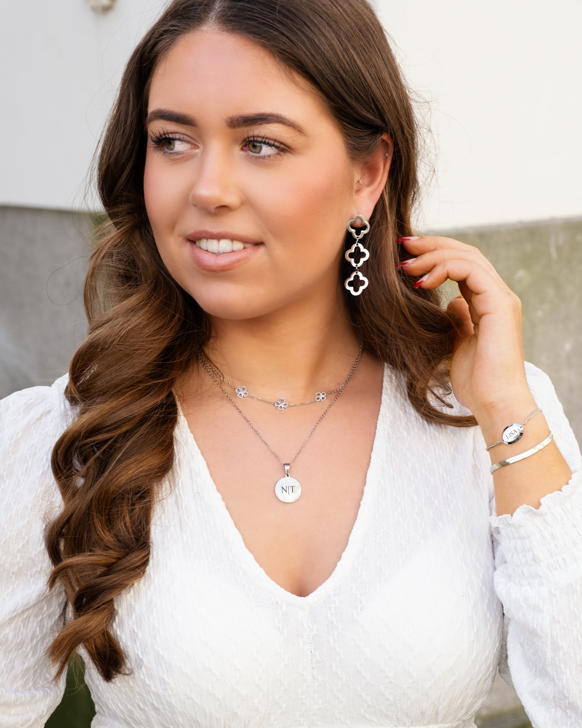 Zilveren charm armband om pols