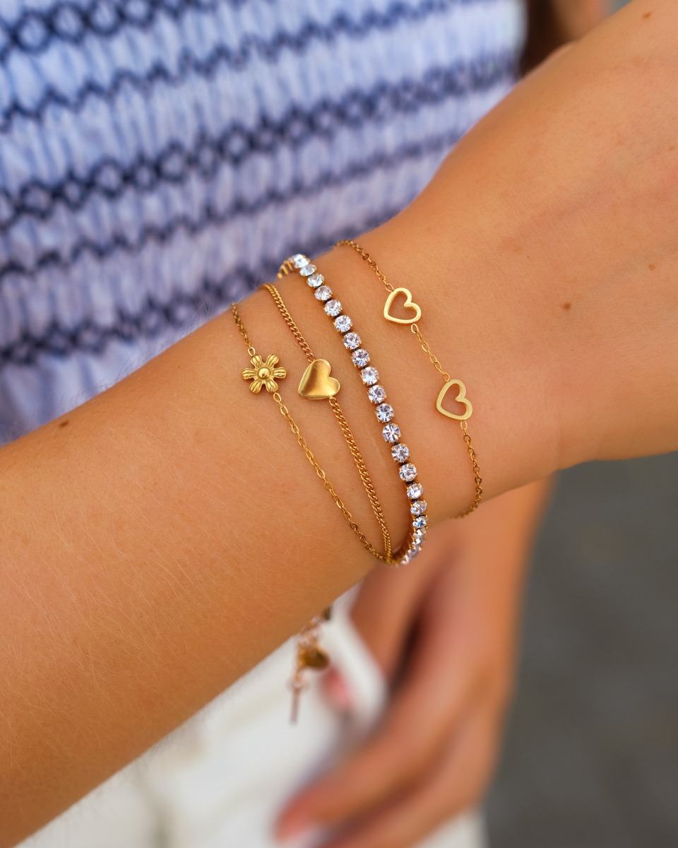Gouden armparty met hartjes
