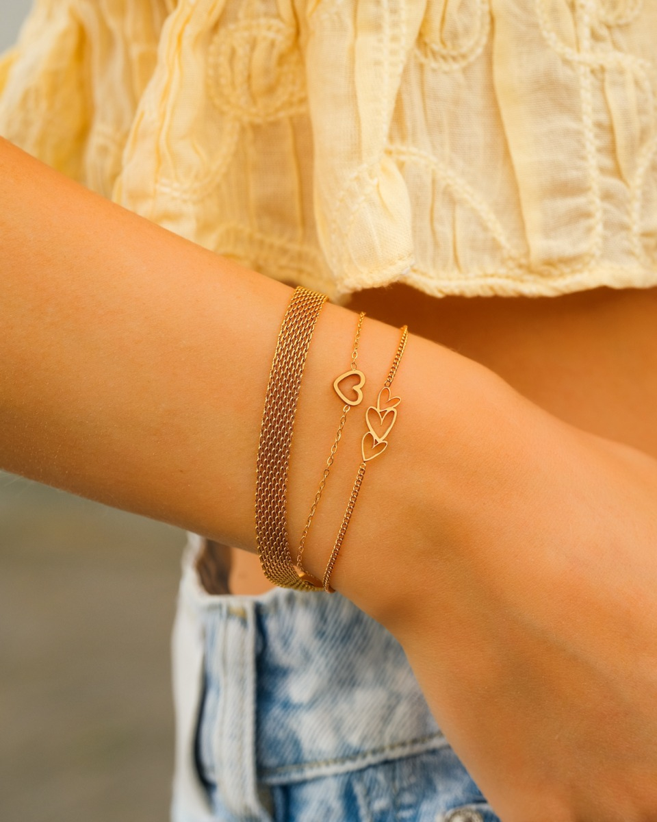 Gouden armparty met hartjes