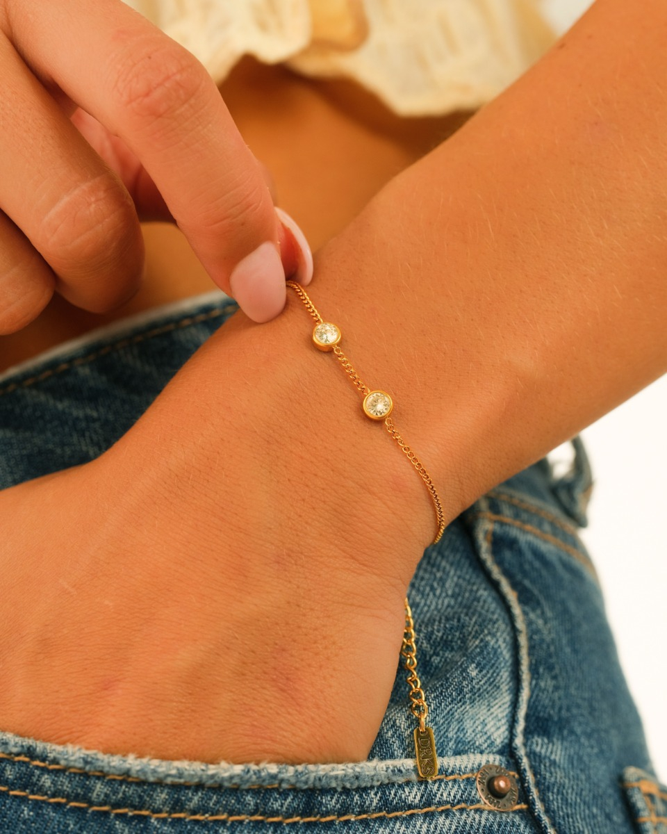 Armband twee steentjes goud