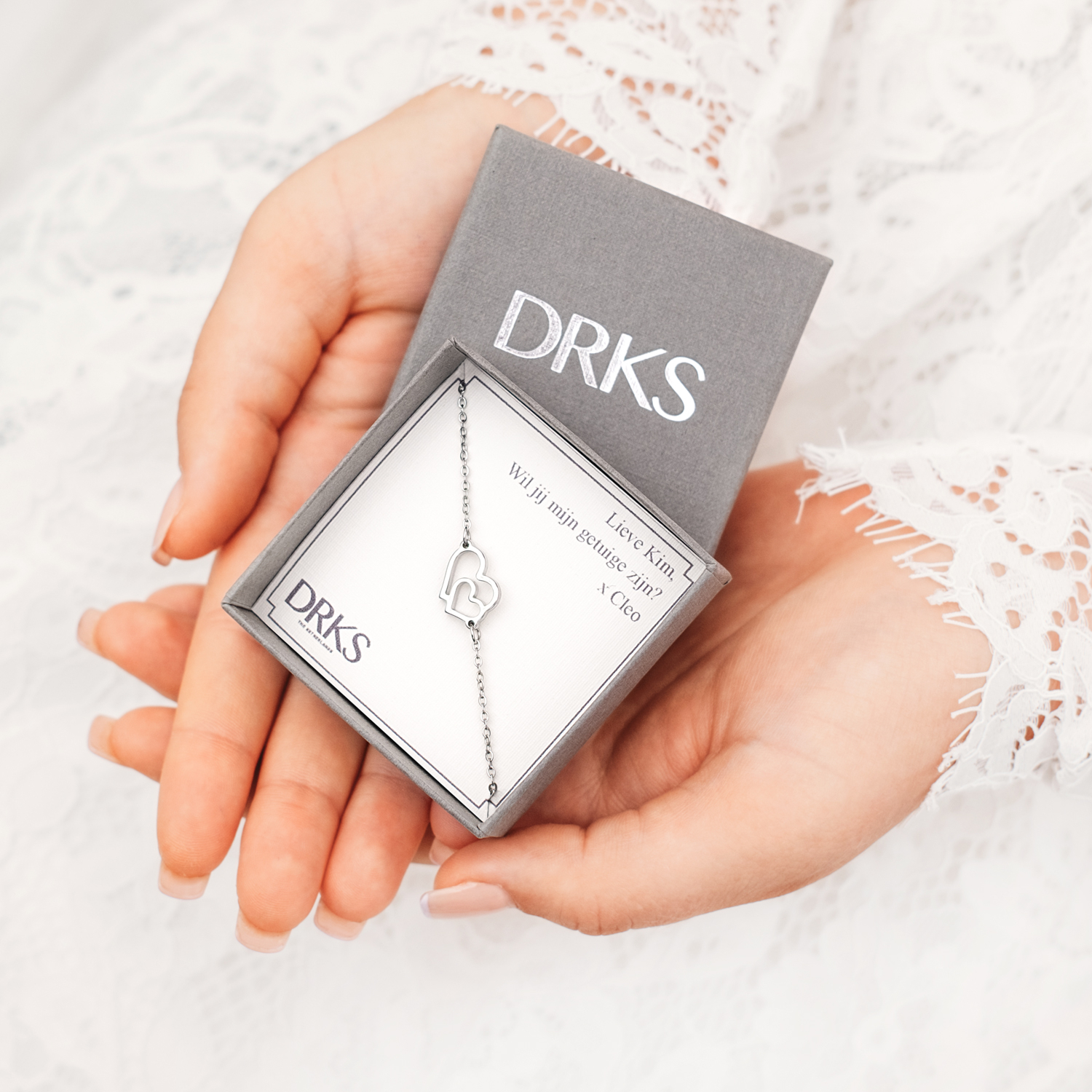 Shop de armbandjes met dubbel hartje