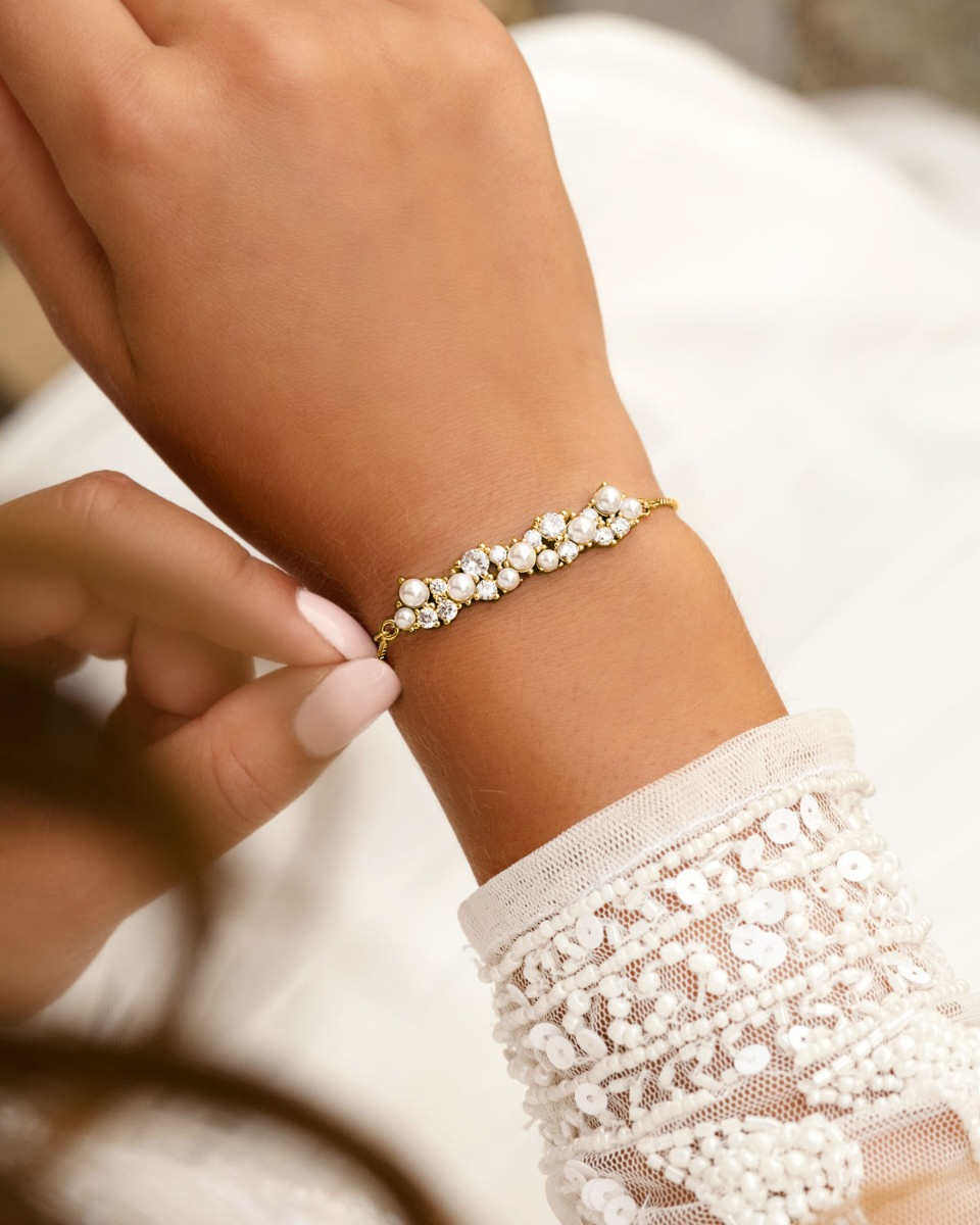 Bruidsarmband goud met parels en steentjes