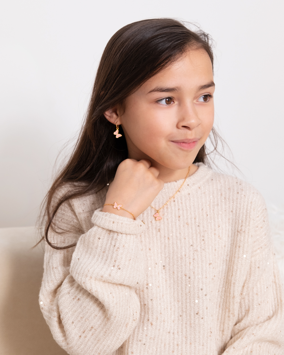 Kids ketting met vlinder in het roze in goud