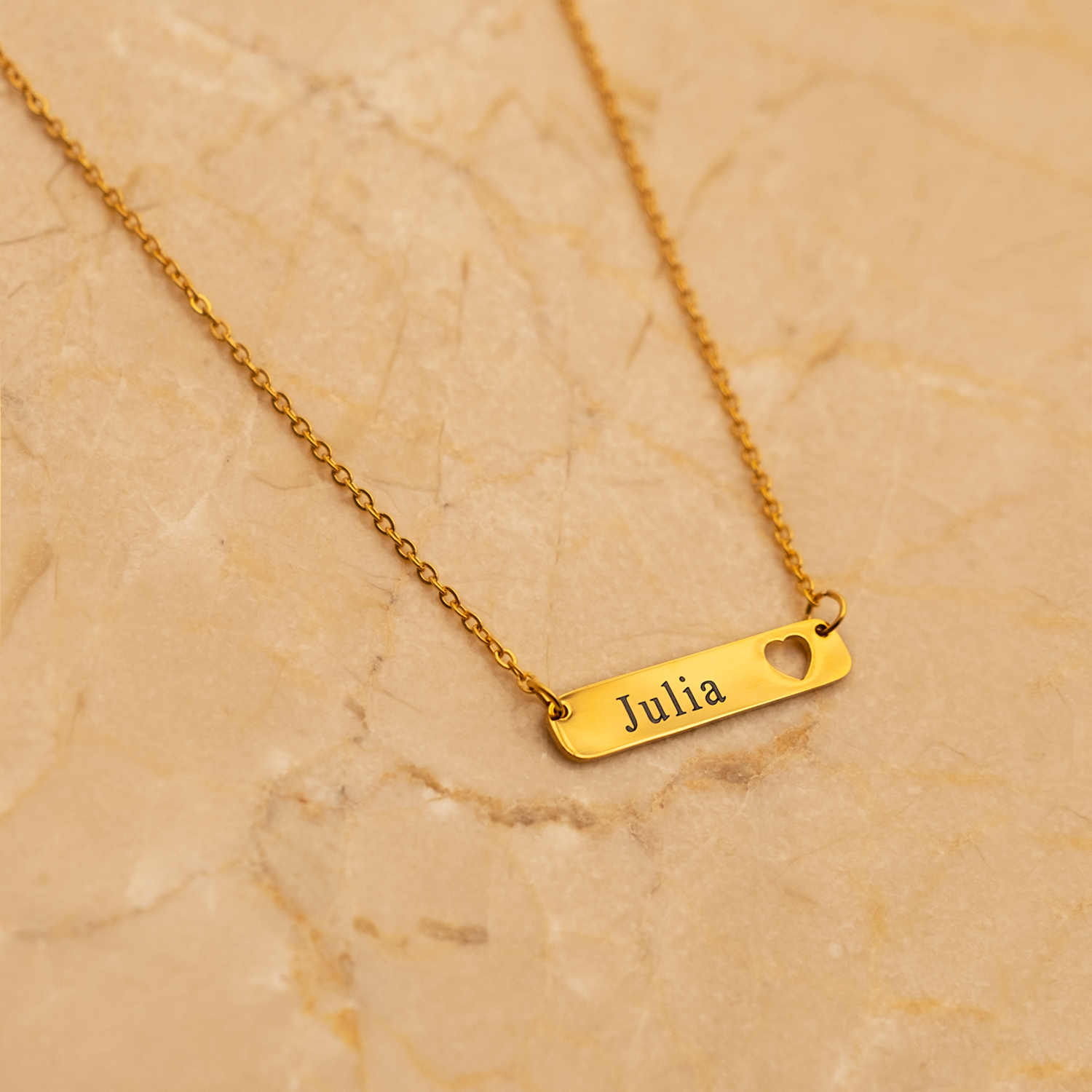 Gouden ketting met gravering hartje