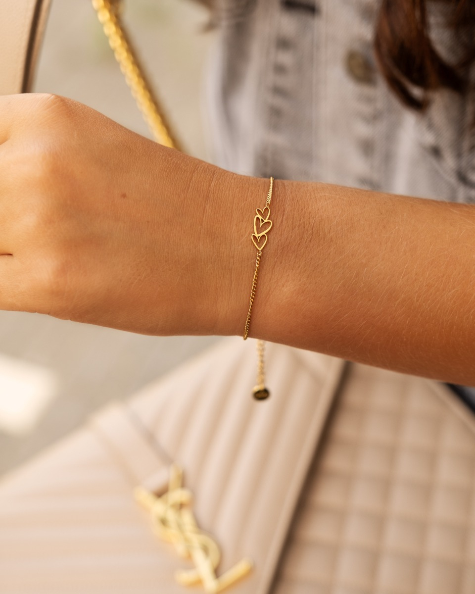 gouden armband met drie hartjes