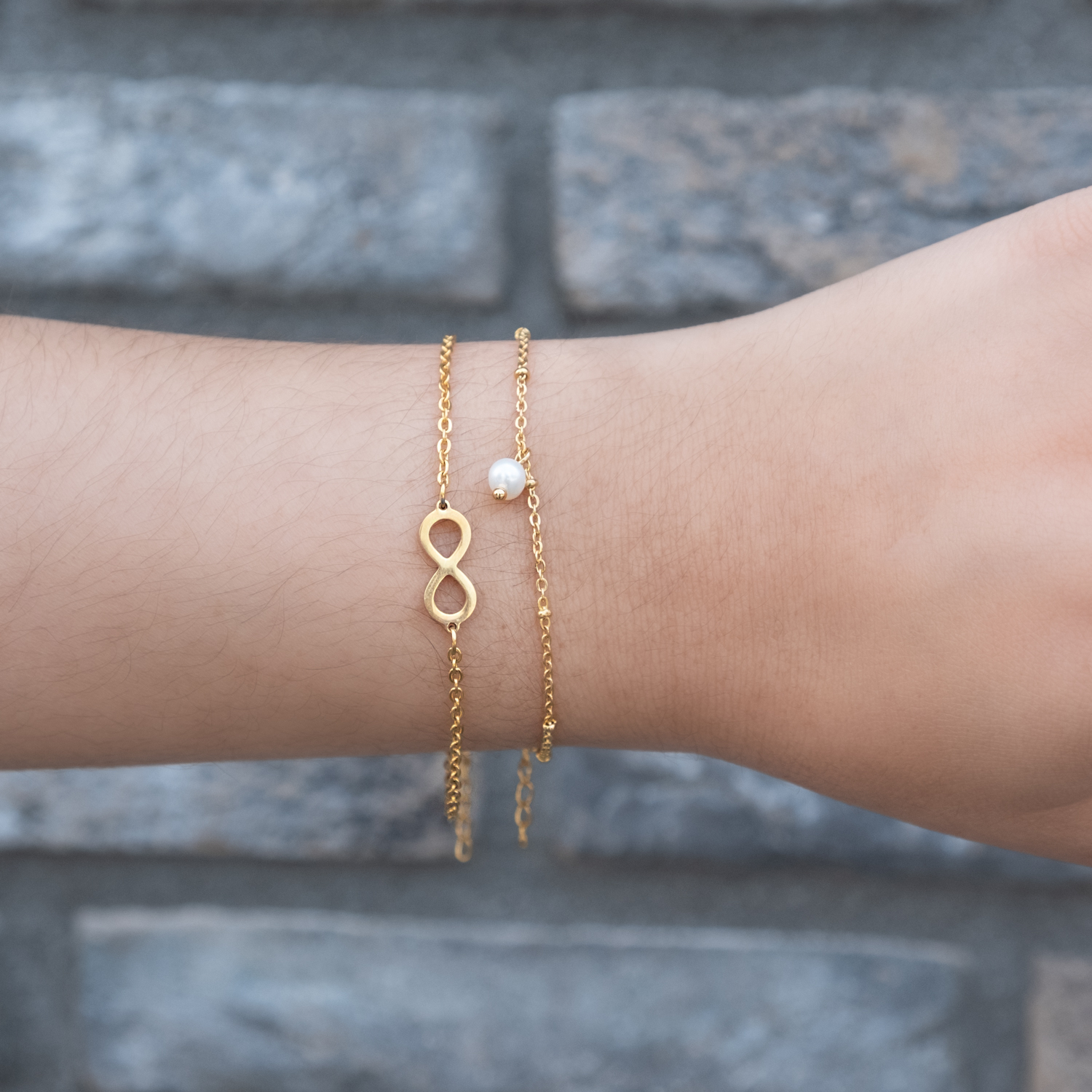 Armband met stainless steel en parel armband