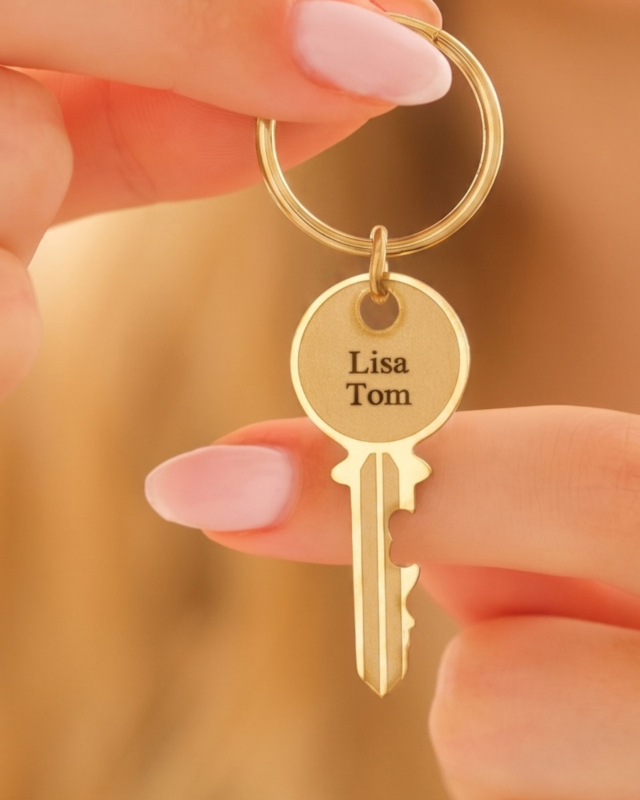 Sleutelhanger met gouden sleutel