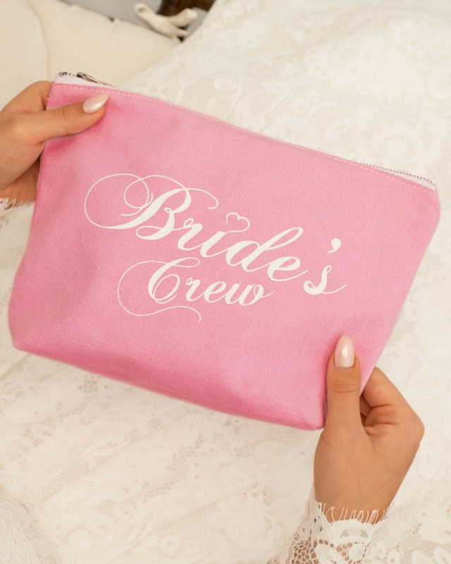 Roze toillettas voor de bride's crew
