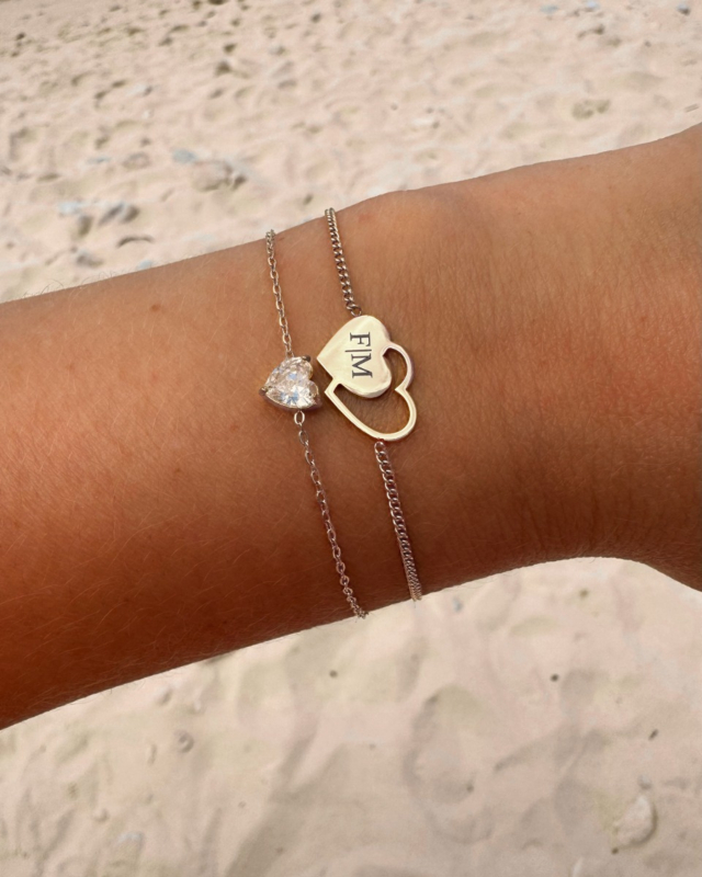 Zilveren armparty met hartjes