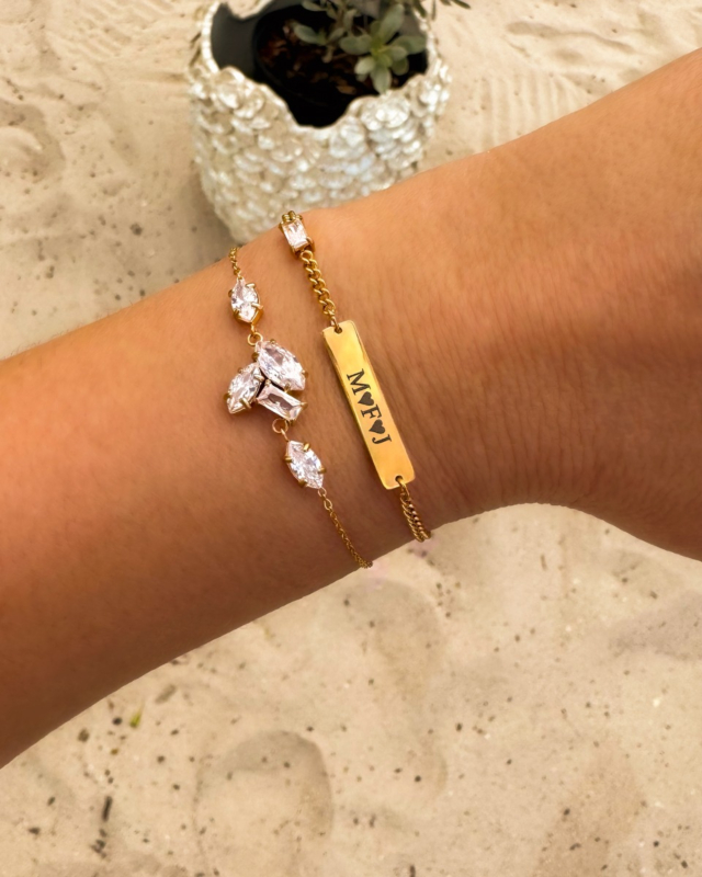 Gouden armparty met steentjes