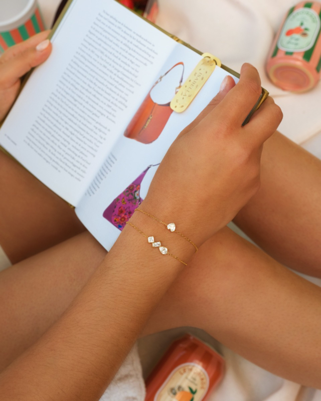 Gouden armparty met steentjes