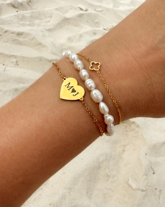 Gouden armparty met gravering