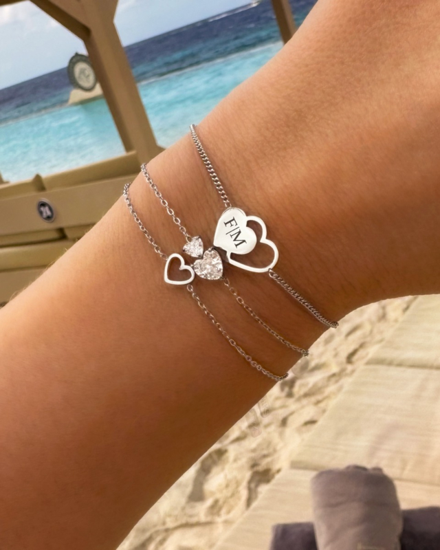 Zilveren armparty met hartjes