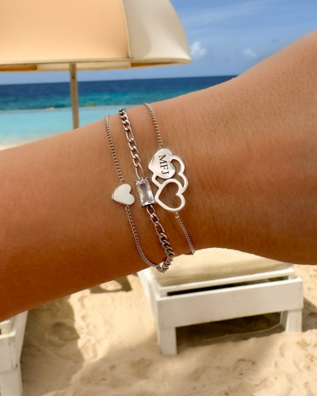 Zilveren armparty met hartjes