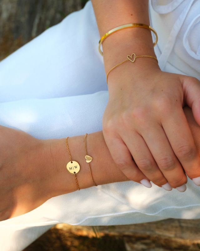Gouden armparty met hartjes