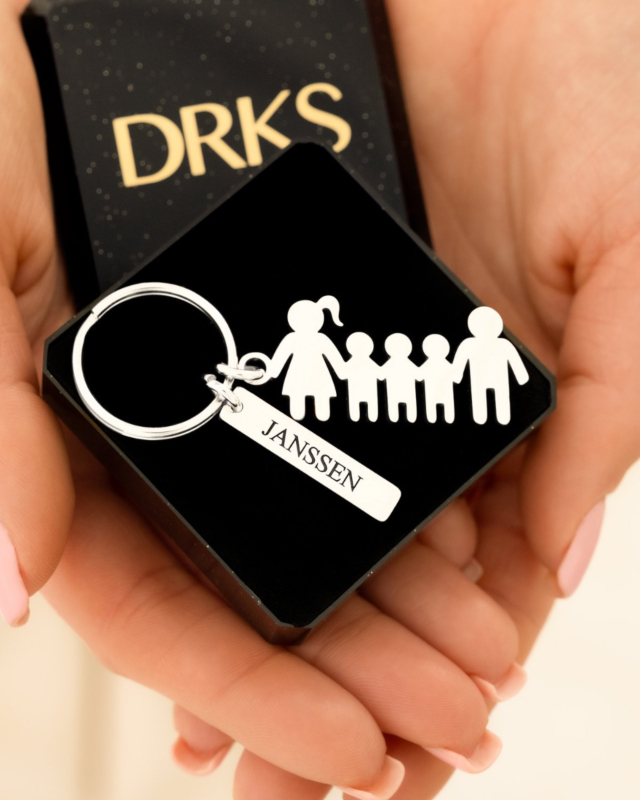 Zilveren poppetjes sleutelhanger in doosje