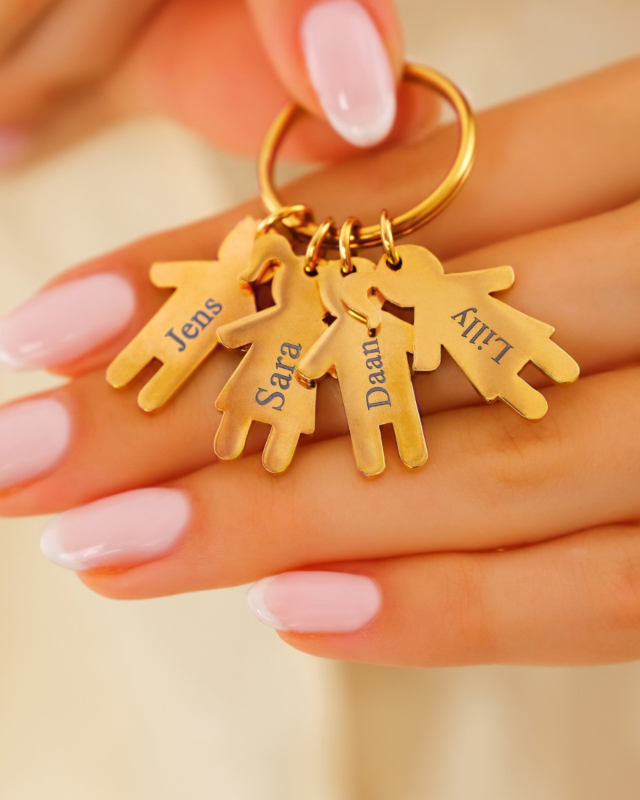 Sleutelhanger met kindjes goud