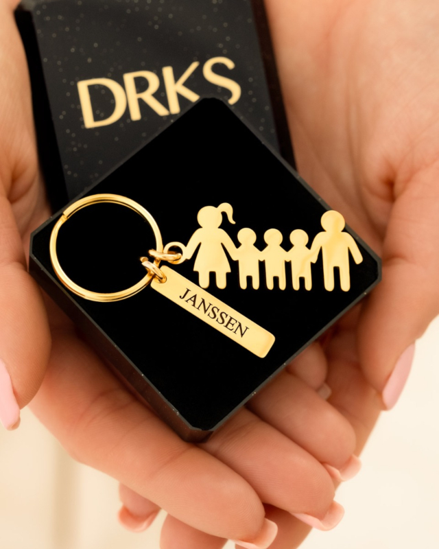 Sleutelhanger met ouders en drie kinderen