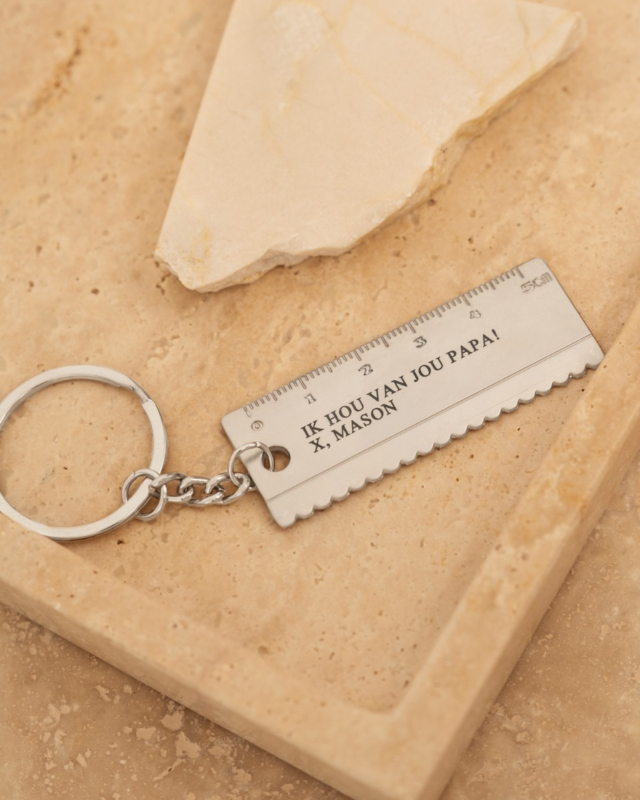 Zilveren sleutelhanger meetlat