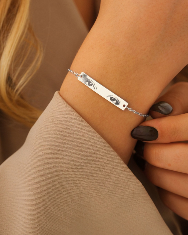 Zilveren bar armband met ogen