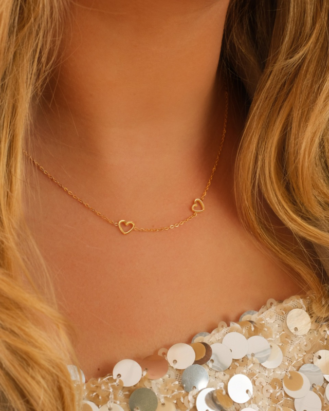 Gouden ketting met 2 hartjes
