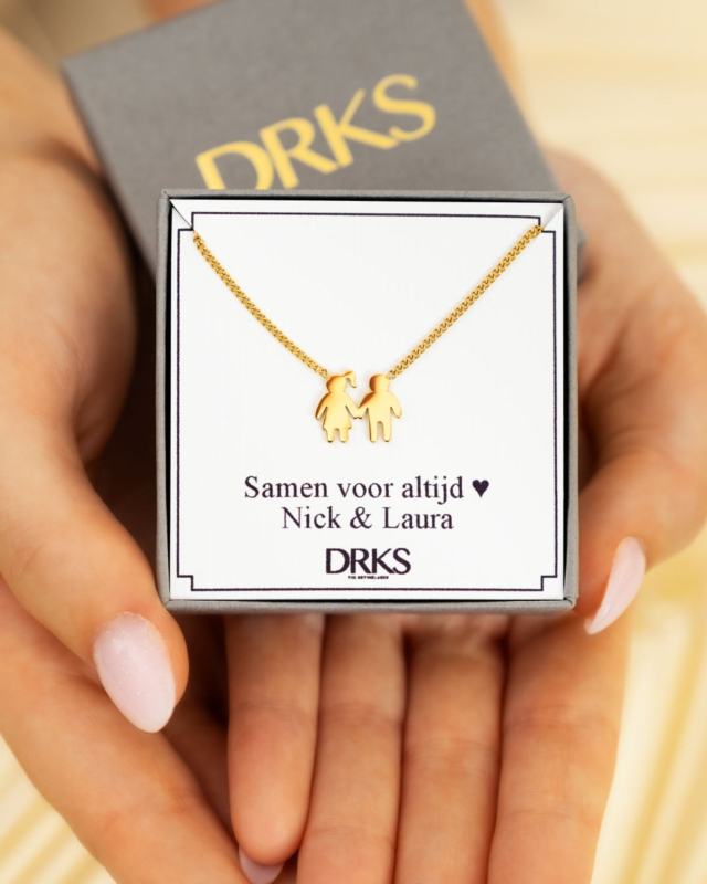 Ketting man en vrouw in sieradendoosje