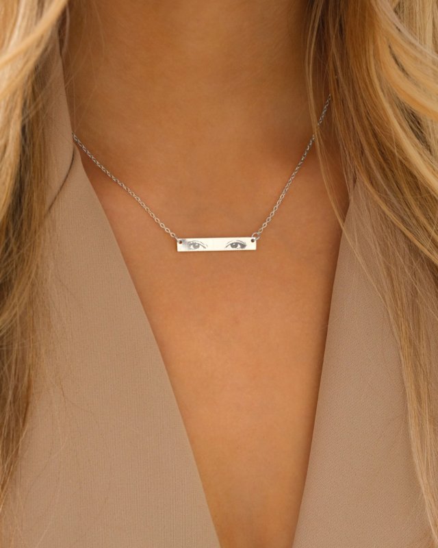 Zilveren bar ketting met ogen