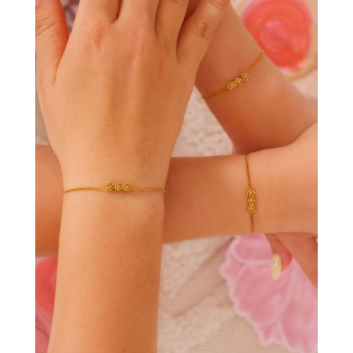 Kids armband triple flower goudkleurig