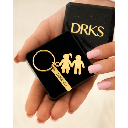 Sleutelhanger man en vrouw goudkleurig