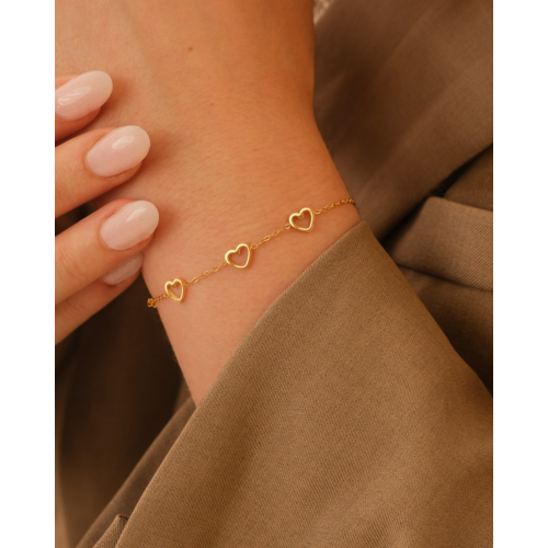 Armband met 3 hartjes goudkleurig