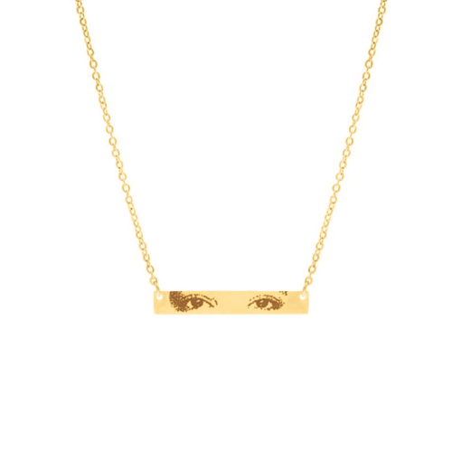 Gouden bar ketting met ogen gegraveerd