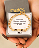 Gouden mannen armband met ogen in sieradendoosje