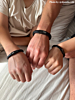 Vader met twee zonen en heren armbanden